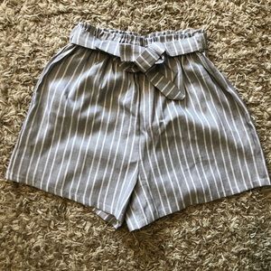 Paper bag shorts in gray with white stripe